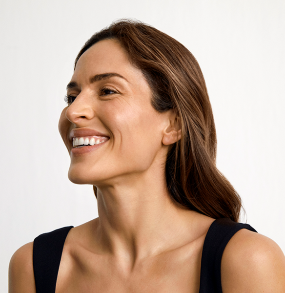 close-up portrait of a middle-aged woman laughing