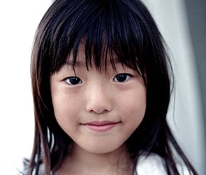 Young girl looking directly at camera